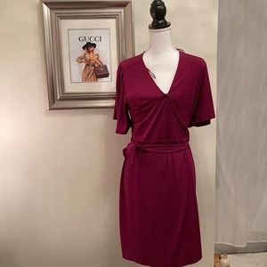 Brand new dress worn once to wedding.